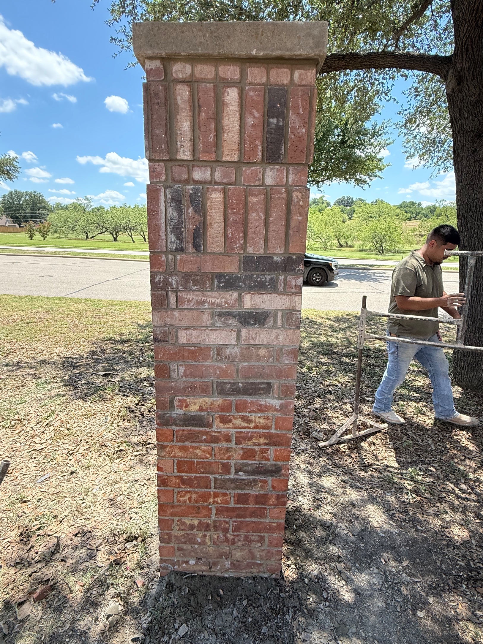 Brick masonry column for a property entryway built by Fence Guy